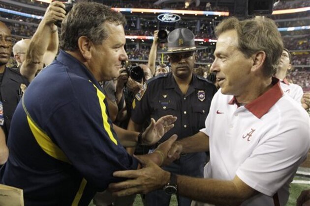 Michigan head coach Brady Hoke, left, and Alabama head coach Nick Saban shake hands after their NCAA college football game at Cowboys Stadium in Arlington, Texas, Saturday, Sept. 1, 2012. Alabama won 41-14. (AP Photo/LM Otero) Michigan head coach Brady Hoke, left, and Alabama head coach Nick Saban shake hands after their NCAA college football game at Cowboys Stadium in Arlington, Texas, Saturday, Sept. 1, 2012. Alabama won 41-14. (AP Photo/LM Otero)