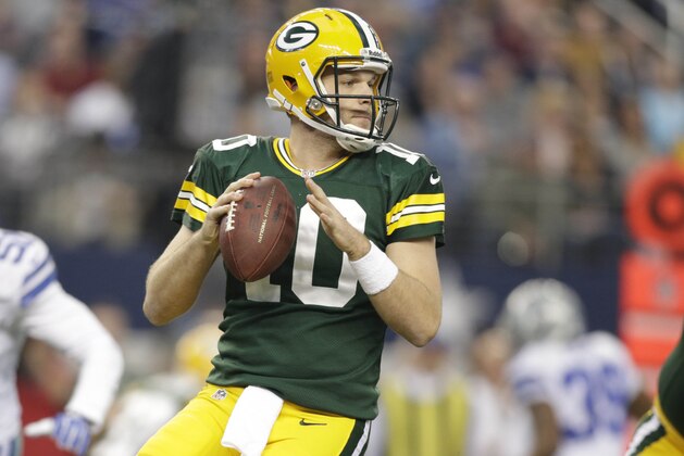 Dec 15, 2013; Arlington, TX, USA;  Green Bay Packers quarterback Matt Flynn (10) throws a pass in the first quarter of the game against the Dallas Cowboys  at AT&T Stadium. Mandatory Credit: Tim Heitman-USA TODAY Sports