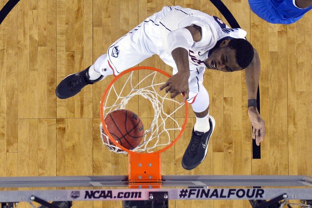 Apr 7, 2014; Arlington, TX, USA; Connecticut Huskies forward DeAndre Daniels (2) dunks after getting past Kentucky Wildcats center Dakari Johnson (44) in the first half during the championship game of the Final Four in the 2014 NCAA Mens Division I Championship tournament at AT&T Stadium. Mandatory Credit: Robert Deutsch-USA TODAY Sports