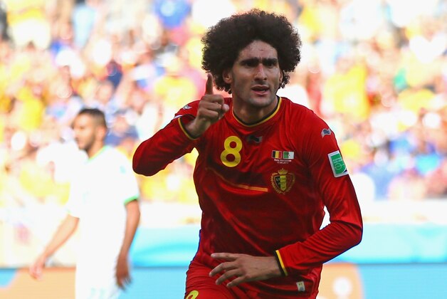 BELO HORIZONTE, BRAZIL - JUNE 17:  Marouane Fellaini of Belgium celebrates scoring his team's first goal during the 2014 FIFA World Cup Brazil Group H match between Belgium and Algeria at Estadio Mineirao on June 17, 2014 in Belo Horizonte, Brazil.  (Photo by Jeff Gross/Getty Images)