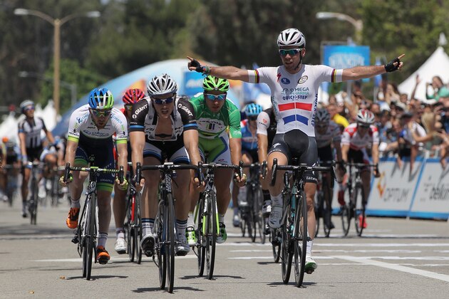 THOUSAND OAKS, CA - MAY 18:  Mark Cavendish (R) of Great Britain riding for the Omega Pharma-Quickstep Cycling Team celebrates his victory over John Degenkolb (L) of Germany riding for Team Giant-Shimano in second place and Peter Sagan (C) of Slovakia riding for the Cannondale Pro Cycling Team in third place in stage eight of the 2014 Amgen Tour of California on May 18, 2014 in Thousand Oaks, California.  (Photo by Doug Pensinger/Getty Images)