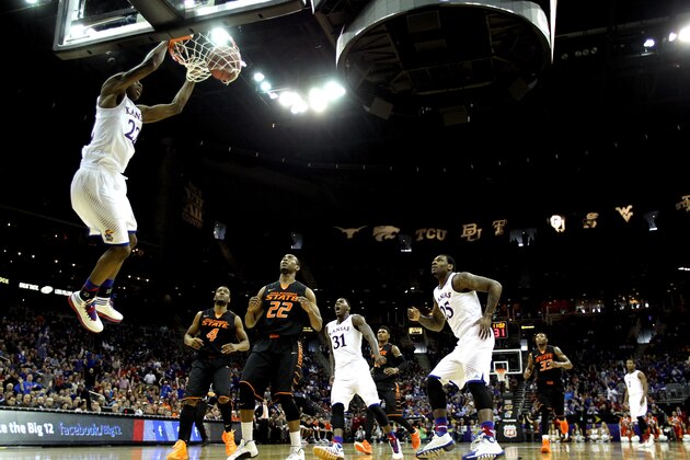 KANSAS CITY, MO - MARCH 13:  Andrew Wiggins #22 of the Kansas Jayhawks dunks on an alley-oop during the Big 12 Basketball Tournament quarterfinal game against the Oklahoma State Cowboys at Sprint Center on March 13, 2014 in Kansas City, Missouri.  (Photo by Jamie Squire/Getty Images)