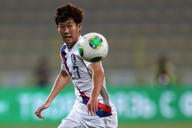 DUBAI, UNITED ARAB EMIRATES - NOVEMBER 19: Son Heung-Min of South Korea in action during the International friendly match between South Korea and Russia at the Zabeel Staduim on November 19, 2013 in Dubai, United Arab Emirates.  (Photo by Francois Nel/Getty Images)