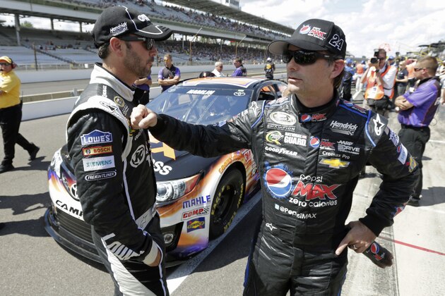 Jeff Gordon, right, talks with Jimmie Johnson after qualifications for the NASCAR Sprint Cup Brickyard 400 auto race at Indianapolis Motor Speedway in Indianapolis, Saturday, July 27, 2013. (AP Photo/AJ Mast) Jeff Gordon, right, talks with Jimmie Johnson after qualifications for the NASCAR Sprint Cup Brickyard 400 auto race at Indianapolis Motor Speedway in Indianapolis, Saturday, July 27, 2013. (AP Photo/AJ Mast)