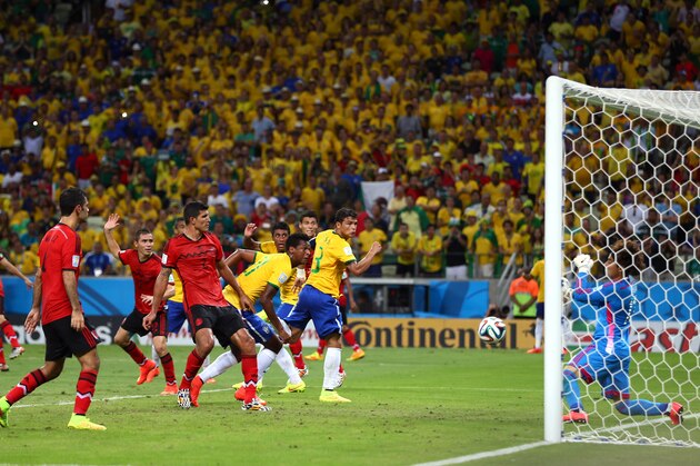 FORTALEZA, BRAZIL - JUNE 17:  Guillermo Ochoa of Mexico makes a save after a header by Thiago Silva of Brazil during the 2014 FIFA World Cup Brazil Group A match between Brazil and Mexico at Castelao on June 17, 2014 in Fortaleza, Brazil.  (Photo by Michael Steele/Getty Images)