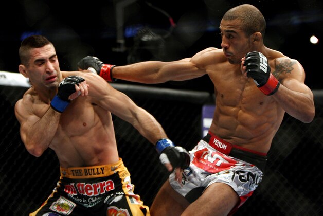 Jose Aldo, right, of Brazil and Ricardo Lamas of Chicago, IL fight in the second round of the Ultimate Fighting Featherweight Championship Mix Martial Arts bout in Newark, N.J. on Saturday, Feb. 1, 2014. Aldo won by unanimous decision in five rounds. (AP Photo/Tim Larsen)