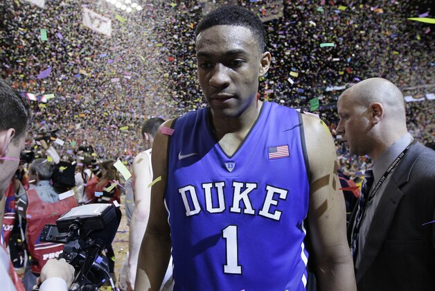 Duke's Jabari Parker (1) walks off the court after losing to Virginia in an NCAA college basketball game in the championship of the Atlantic Coast Conference tournament in Greensboro, N.C., Sunday, March 16, 2014. Virginia won 72-63. (AP Photo/Gerry Broome)
