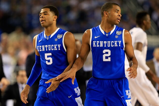 ARLINGTON, TX - APRIL 07: Andrew Harrison #5 and Aaron Harrison #2 of the Kentucky Wildcats react during the NCAA Men's Final Four Championship against the Connecticut Huskies at AT&T Stadium on April 7, 2014 in Arlington, Texas.  (Photo by Jamie Squire/Getty Images)