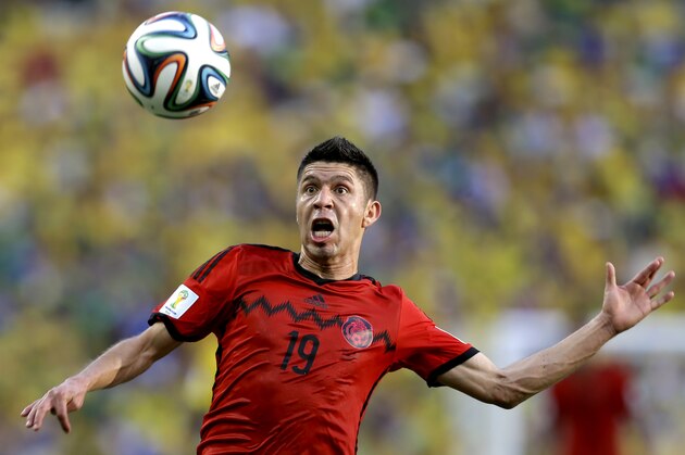 Mexico's Oribe Peralta eyes the ball during the group A World Cup soccer match between Brazil and Mexico at the Arena Castelao in Fortaleza, Brazil, Tuesday, June 17, 2014.  (AP Photo/Martin Mejia)