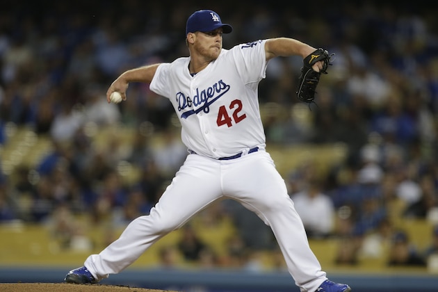 Los Angeles Dodgers starting pitcher Chad Billingsley throws against the San Diego Padres during the first inning of a baseball game in Los Angeles, Monday, April 15, 2013. (AP Photo/Jae C. Hong)
