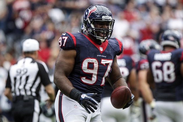 Sep 29, 2013; Houston, TX, USA; Houston Texans defensive tackle Terrell McClain (97) reacts after recovering a fumble during the second quarter against the Seattle Seahawks at Reliant Stadium. Mandatory Credit: Troy Taormina-USA TODAY Sports