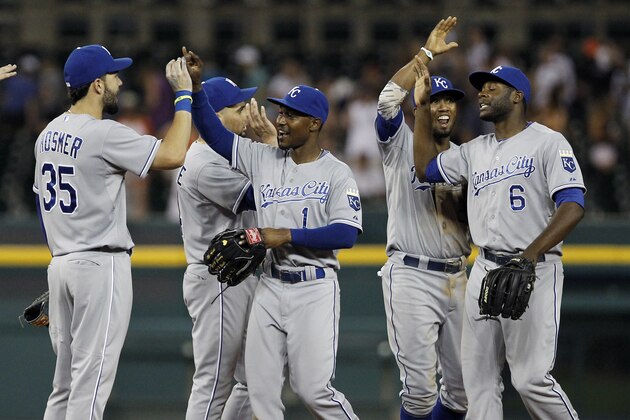 DETROIT, MI - JUNE 17:  Eric Hosmer #35 of the Kansas City Royals celebrates with teammates Omar Infante #14, Jarrod Dyson #1, Alcides Escobar #2 and Lorenzo Cain #6 after defeating the Detroit Tigers 11-4 and taking first place in the AL Central at Comerica Park on June 17, 2014 in Detroit, Michigan. (Photo by Duane Burleson/Getty Images)