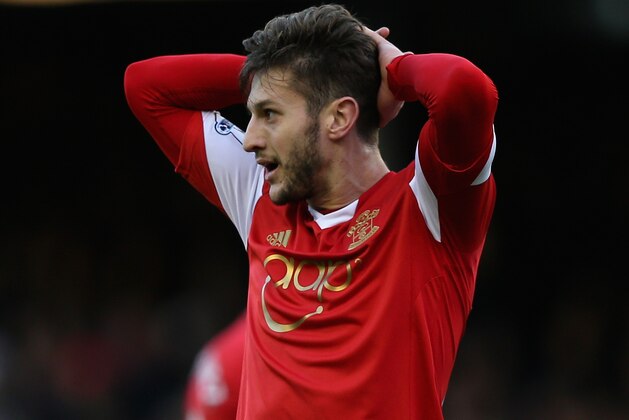 LIVERPOOL, ENGLAND - DECEMBER 29:  Adam Lallana of Southampton reacts during the Barclays Premier League match between Everton and Southampton at Goodison Park on December 29, 2013 in Liverpool, England.  (Photo by Clive Brunskill/Getty Images)