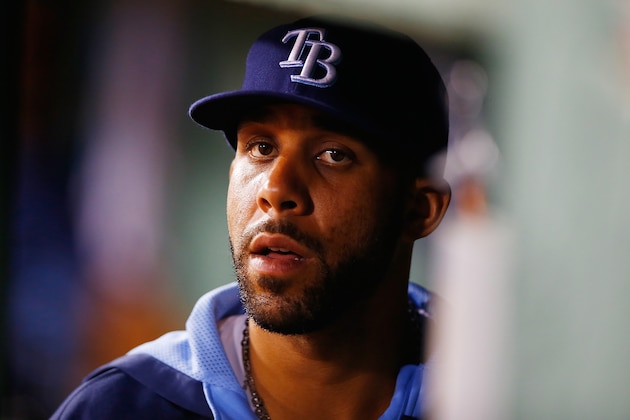 BOSTON, MA - MAY 31: David Price #14 of the Tampa Bay Rays watches the game from the dugout against the Boston Red Sox during the game at Fenway Park on May 31, 2014 in Boston, Massachusetts.  (Photo by Jared Wickerham/Getty Images)