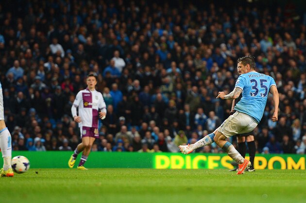 MANCHESTER, ENGLAND - MAY 07: Stevan Jovetic of Manchester City scores his team's third goal during the Barclays Premier League match between Manchester City and Aston Villa at Etihad Stadium on May 7, 2014 in Manchester, England.  (Photo by Michael Regan/Getty Images)