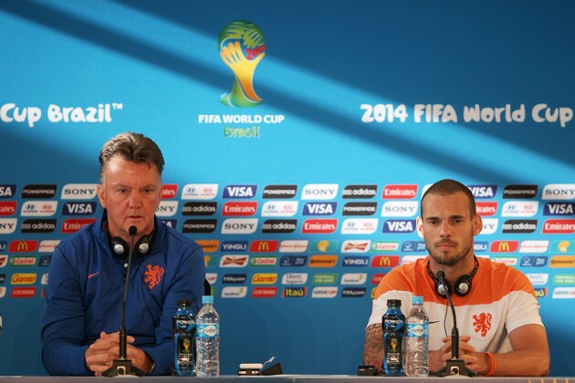 PORTO ALEGRE, BRAZIL - JUNE 17:  Manager of Netherlands Louis van Gaal and Wesley Sneijder get ready to speak to the media at the Netherlands Press Conference at the 2014 FIFA World Cup Brazil held at the Estadio Beira-Rio on June 17, 2014 in Porto Alegre, Brazil.  (Photo by Dean Mouhtaropoulos/Getty Images)