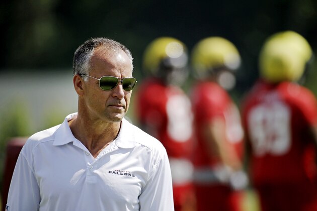 Atlanta Falcons defensive coordinator Mike Nolan watches over an NFL football organized team activity, Wednesday, June 4, 2014, in Flowery Branch, Ga. (AP Photo/David Goldman)