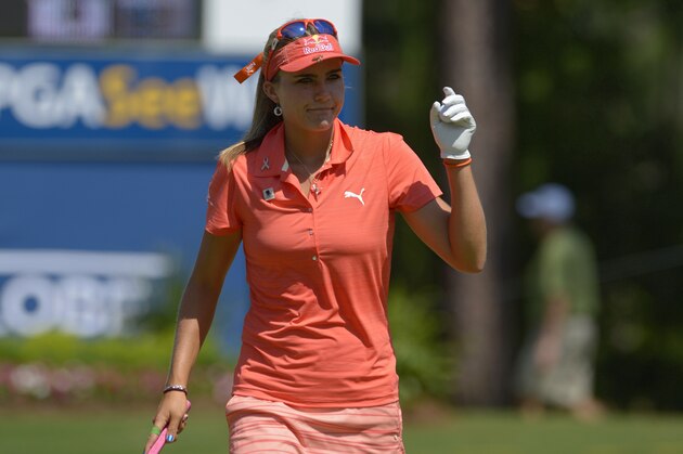Lexi Thompson acknowledges the crowd after putting on the 18th hole during the second round of the Airbus LPGA Classic golf tournament at Magnolia Grove on Friday, May 23, 2014, in Mobile, Ala. (AP Photo/G.M. Andrews)