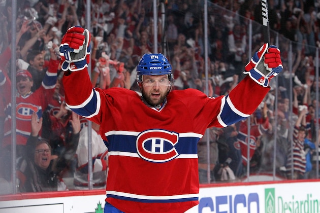 MONTREAL, QC - MAY 12:  Thomas Vanek #20 of the Montreal Canadiens celebrates his second-period goal against the Boston Bruins in Game Six of the Second Round of the 2014 NHL Stanley Cup Playoffs at the Bell Centre on May 12, 2014 in Montreal, Quebec, Canada. (Photo by Francois Laplante/Freestyle Photography/Getty Images)