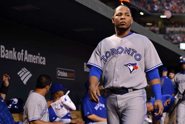 Jun 13, 2014; Baltimore, MD, USA; Toronto Blue Jays first baseman Edwin Encarnacion (10) walks through the dugout during the sixth inning against the Baltimore Orioles  at Oriole Park at Camden Yards. Mandatory Credit: Tommy Gilligan-USA TODAY Sports