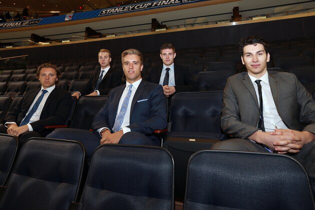 NEW YORK, NY - JUNE 9:  NHL Top Prospects (left to right) Sam Reinhart, Sam Bennett, Aaron Ekblad, Leon Draisaitl and Michael DalCole take in morning skate before Game Three of the 2014 Stanley Cup Final between the Los Angeles Kings and the New York Rangers at Madison Square Garden on June 9, 2014 in New York, New York.  (Photo by Dave Sandford/NHLI via Getty Images)