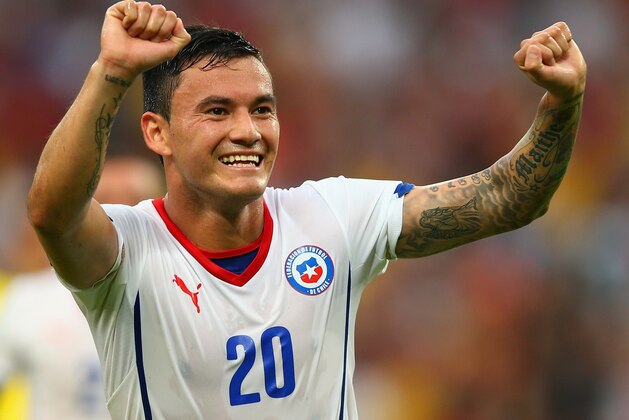 RIO DE JANEIRO, BRAZIL - JUNE 18:  Charles Aranguiz of Chile celebrates scoring his team's second goal during the 2014 FIFA World Cup Brazil Group B match between Spain and Chile at Maracana on June 18, 2014 in Rio de Janeiro, Brazil.  (Photo by Clive Rose/Getty Images)