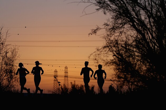 DUBAI, UNITED ARAB EMIRATES - MAY 04:  Competitors take part in the 10km Wings for Life World Run at Nad Al Sheba Cycle Park on May 4, 2014 in Dubai, United Arab Emirates.  (Photo by Francois Nel/Getty Images)