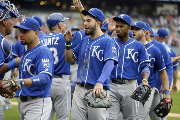 Kansas City Royals' Eric Hosmer, center, and teammates celebrate their 2-1 win over the Detroit Tigers in a baseball game in Detroit, Wednesday, June 18, 2014. It was the Royals' 10th straight win. (AP Photo/Carlos Osorio)