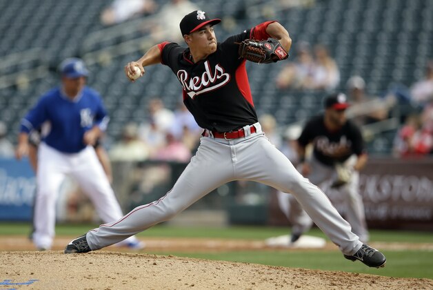 Cincinnati Reds' Robert Stephenson delivers to the Kansas City Royals in the fifth inning of a spring training baseball game, Tuesday, March 4, 2014, in Surprise, Ariz. (AP Photo/Tony Gutierrez)