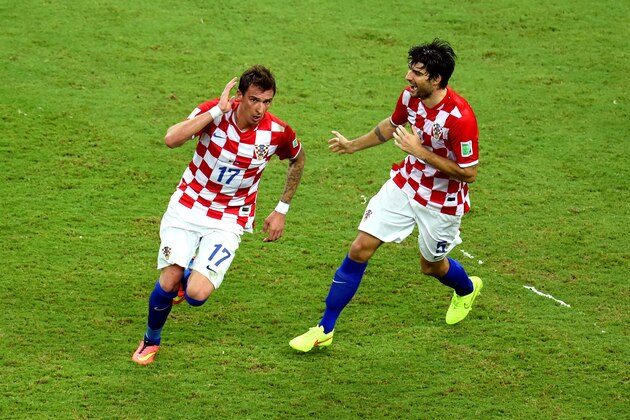 MANAUS, BRAZIL - JUNE 18:  Mario Mandzukic of Croatia celebrates scoring his team's third goal during the 2014 FIFA World Cup Brazil Group A match between Cameroon and Croatia at Arena Amazonia on June 18, 2014 in Manaus, Brazil.  (Photo by Stu Forster/Getty Images)