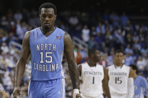 FILE - In this March 17, 2013, file photo, North Carolina's P.J. Hairston (15) walks downcourt during an NCAA college basketball game against Miami for the championship of the Atlantic Coast Conference tournament in Greensboro, N.C. A rental car driven by suspended North Carolina player Hairston also had a dozen campus parking citations over a two-month period, according to records released by the university Friday, Aug. 9, 2013. (AP Photo/Gerry Broome, File)