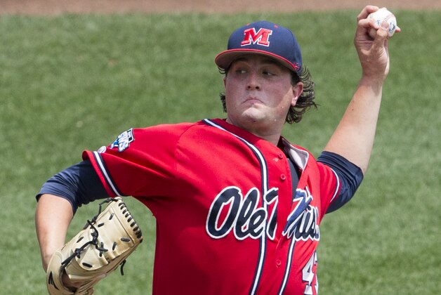Mississippi pitcher Christian Trent (47) works against Texas Tech in the first inning of an elimination baseball game at the NCAA College World Series in Omaha, Neb., Tuesday, June 17, 2014. (AP Photo/Nati Harnik)