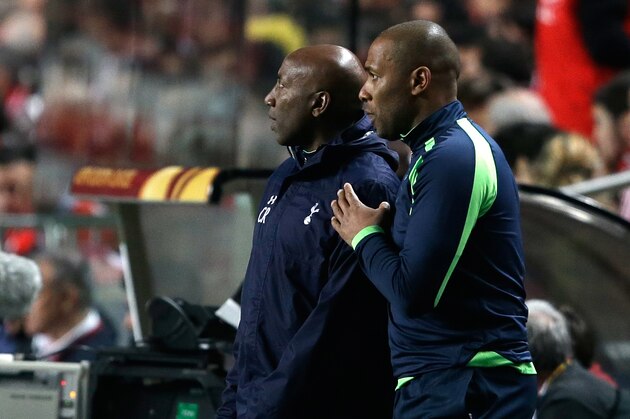 Tottenham Hotspur's assistant coachs Chris Ramsey, left, and Les Ferdinand watch from the sideline during their Europa League round of 16, second leg, soccer match with Benfica Thursday, March 20, 2014, at Benfica's Luz stadium. (AP Photo / Armando Franca) Tottenham Hotspur's assistant coachs Chris Ramsey, left, and Les Ferdinand watch from the sideline during their Europa League round of 16, second leg, soccer match with Benfica Thursday, March 20, 2014, at Benfica's Luz stadium. (AP Photo / Armando Franca)