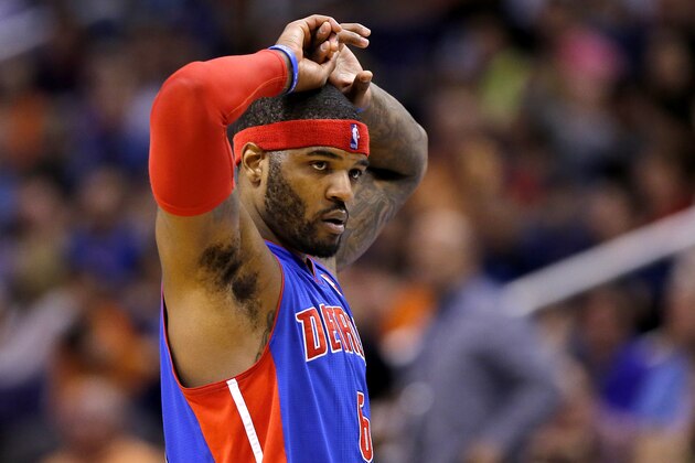 Detroit Pistons' Josh Smith walks to the bench during the second half of an NBA basketball game against the Phoenix Suns, Friday, March 21, 2014, in Phoenix. The Suns won 98-92. (AP Photo/Matt York)