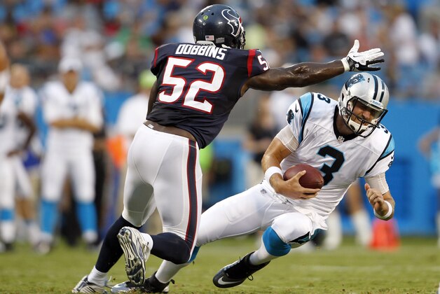 Carolina Panthers quarterback Derek Anderson (3) is pressured by Houston Texans' Tim Dobbins (52) during the first half of a NFL preseason football game in Charlotte, N.C., Saturday, Aug. 11, 2012. (AP Photo/Bob Leverone) Carolina Panthers quarterback Derek Anderson (3) is pressured by Houston Texans' Tim Dobbins (52) during the first half of a NFL preseason football game in Charlotte, N.C., Saturday, Aug. 11, 2012. (AP Photo/Bob Leverone)