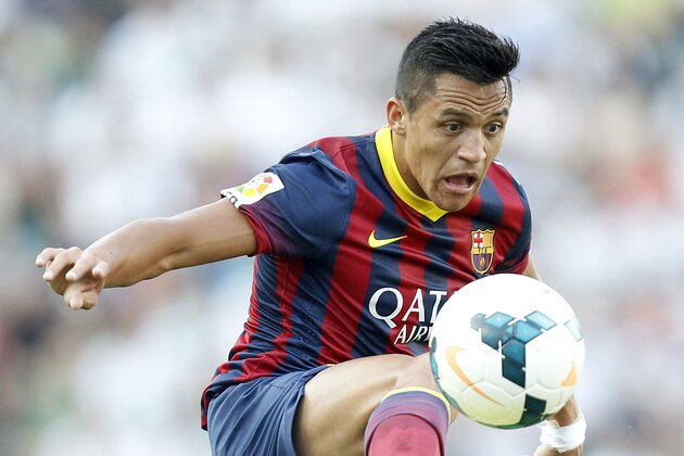 Barcelona's Alexis Sanchez from Chile controls the ball during a Spanish La Liga soccer match against Elche at the Martinez Valero stadium in Elche, Spain, on Sunday, May 11, 2014.(AP Photo/Alberto Saiz)