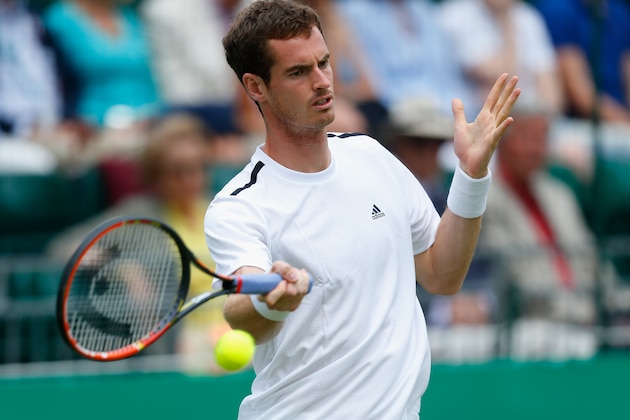 LONDON, ENGLAND - JUNE 19:  Andy Murray of Great Britain in action during his Men's Singles match against Tommy Robredo of Spain at the BNP Paribas Tennis Classic at the Hurlingham Club on June 19, 2014 in London, England.  (Photo by Harry Engels/Getty Images)