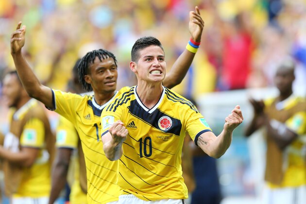 BRASILIA, BRAZIL - JUNE 19:  James Rodriguez of Colombia celebrates scoring his team's first goal during the 2014 FIFA World Cup Brazil Group C match between Colombia and Cote D'Ivoire at Estadio Nacional on June 19, 2014 in Brasilia, Brazil.  (Photo by Elsa/Getty Images)