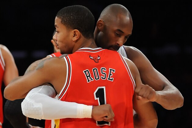 LOS ANGELES, CA - DECEMBER 25:  Kobe Bryant #24 of the Los Angeles Lakers greets Derrick Rose #1 of the Chicago Bulls before the game at Staples Center on December 25, 2011 in Los Angeles, California.  NOTE TO USER: User expressly acknowledges and agrees that, by downloading and or using this photograph, User is consenting to the terms and conditions of the Getty Images License Agreement.  (Photo by Lisa Blumenfeld/Getty Images)