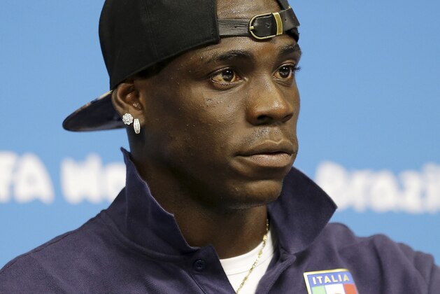 Italy's Mario Balotelli attends a press conference at Arena Pernambuco stadium in Recife, Brazil, Thursday, June 19, 2014. Italy plays in group D at the soccer World Cup. (AP Photo/Antonio Calanni)