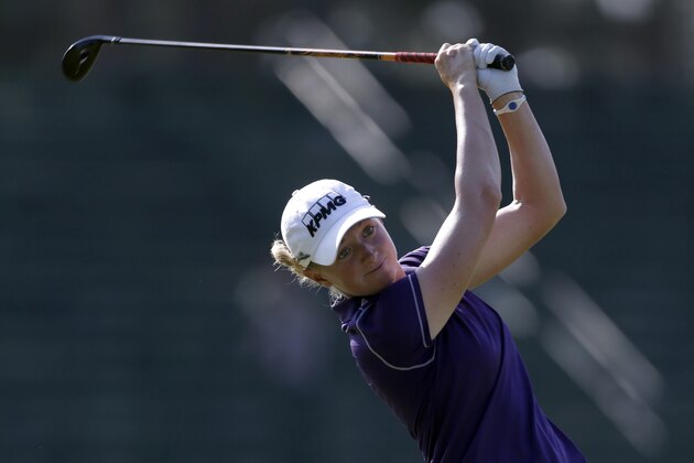 Stacy Lewis watches her tee shot on the 13th hole during the first round of the U.S. Women's Open golf tournament in Pinehurst, N.C., Thursday, June 19, 2014. (AP Photo/Bob Leverone)