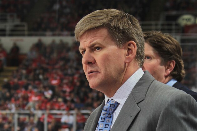 DETROIT, MI - FEBRUARY 10: Assistant coach Bill Peters of the Detroit Red Wings follows the play from the bench during a NHL game against the Los Angeles Kings at Joe Louis Arena on February 10, 2013 in Detroit, Michigan. Detroit defeated Loas Angeles 3-2  (Photo by Dave Reginek/NHLI via Getty Images)