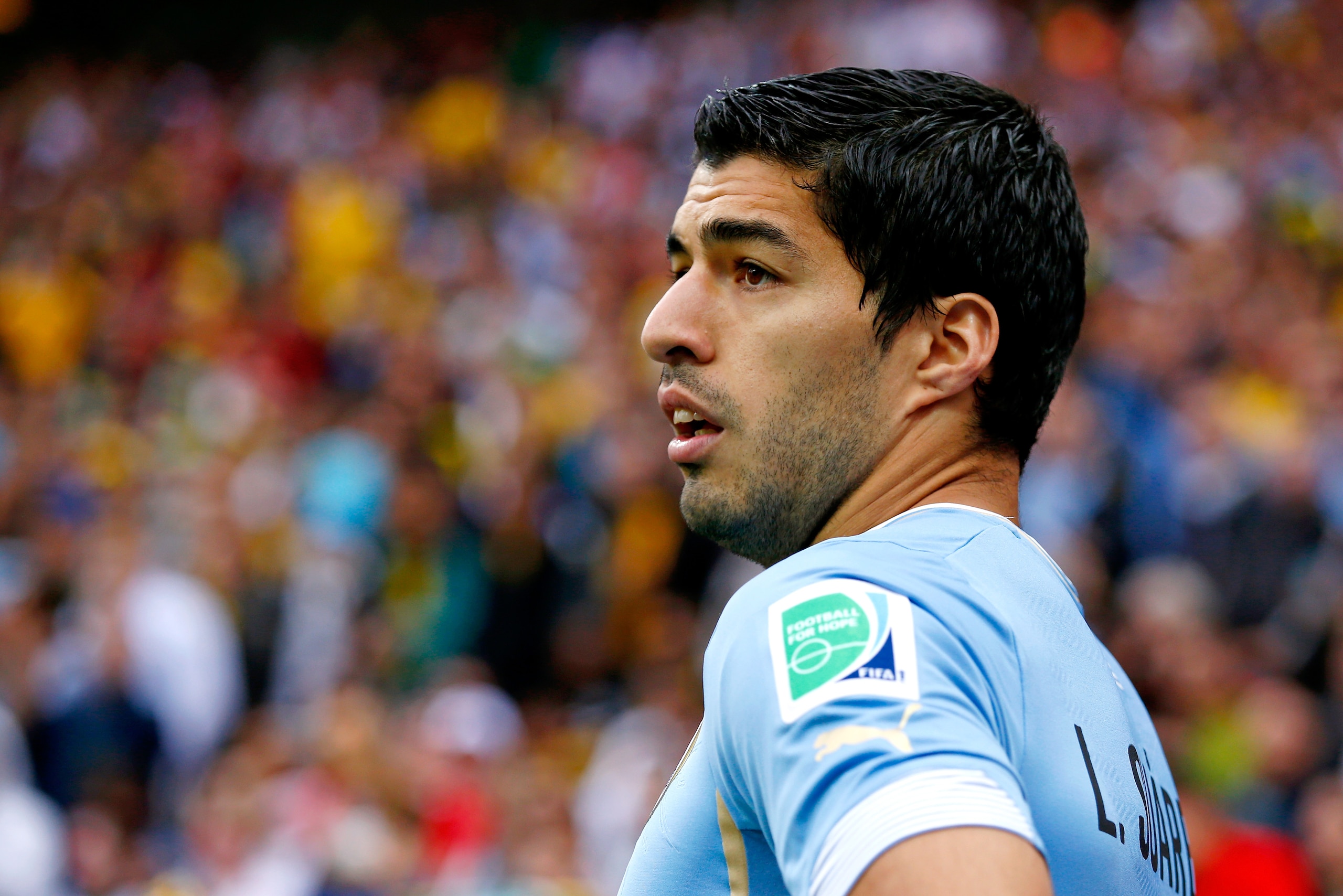 SAO PAULO, BRAZIL - JUNE 19:  Luis Suarez of Uruguay looks on during the 2014 FIFA World Cup Brazil Group D match between Uruguay and England at Arena de Sao Paulo on June 19, 2014 in Sao Paulo, Brazil.  (Photo by Clive Rose/Getty Images)
