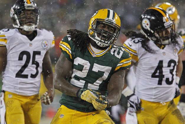Green Bay Packers running back Eddie Lacy reacts after rushing against the Pittsburgh Steelers during an NFL football game Sunday, Dec. 22, 2013, in Green Bay, Wis. (AP Photo/Matt Ludtke)
