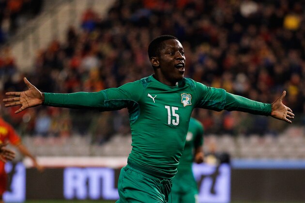 BRUSSELS, BELGIUM - MARCH 05:  Max-Alain Gradel #15 of Ivory Coast celebrates after he scores his teams second goal during the International Friendly match between Belgium and Ivory Coast at The King Baudouin Stadium on March 5, 2014 in Brussels, Belgium.  (Photo by Dean Mouhtaropoulos/Getty Images)