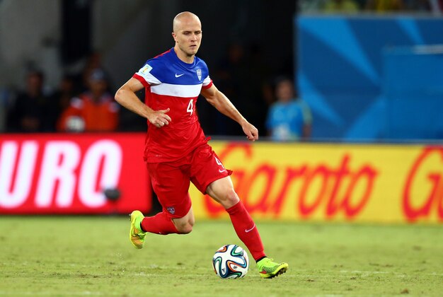 Jun 16, 2014; Natal, BRAZIL; USA midfielder Michael Bradley (4) against Ghana during the 2014 World Cup at Estadio das Dunas. Mandatory Credit: Mark J. Rebilas-USA TODAY Sports