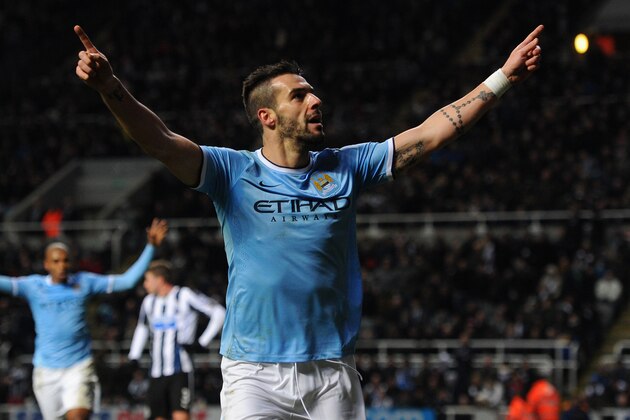 NEWCASTLE UPON TYNE, ENGLAND - JANUARY 12:  Manchester City striker Alvaro Negredo celebrates after scoring the second goal during the Barclays Premier League match between Newcastle United and Manchester City at St James' Park on January 12, 2014 in Newcastle upon Tyne, England.  (Photo by Stu Forster/Getty Images)