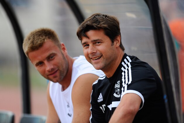 GIRONA, SPAIN - JULY 17:  Manager Mauricio Pochettino (R) and Artur Boruc of Southampton looks on during a friendly match between Southampton FC and UE Llagostera at the Josep Pla i Arbones Stadium on July 17, 2013 in Girona, Spain.  (Photo by David Ramos/Getty Images)