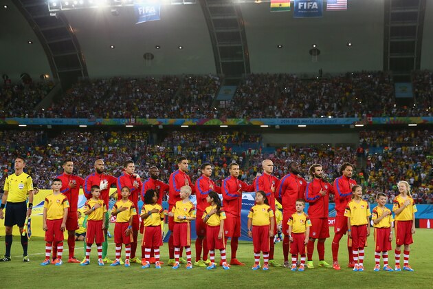 NATAL, BRAZIL - JUNE 16:  Players of the United States line up on the field before the 2014 FIFA World Cup Brazil Group G match between Ghana and the United States at Estadio das Dunas on June 16, 2014 in Natal, Brazil.  (Photo by Kevin C. Cox/Getty Images)