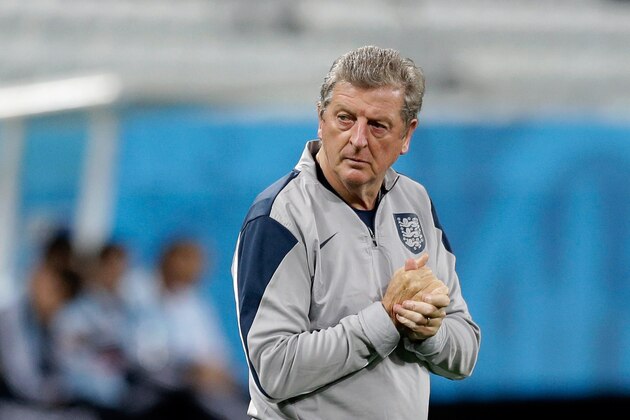 England's manager Roy Hodgson watches his players during a squad training session for the 2014 soccer World Cup at Itaquerao Stadium in Sao Paulo, Brazil, Wednesday, June 18, 2014.  Uruguay play England in group D of the 2014 soccer World Cup at the stadium on Thursday.  (AP Photo/Matt Dunham)